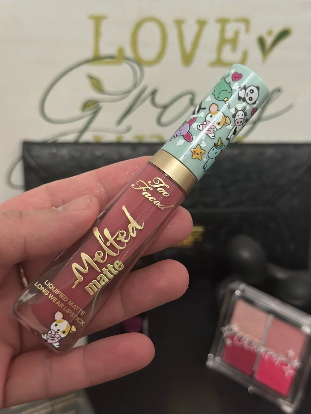 Makeup essentials (7 pieces) with pouch.
